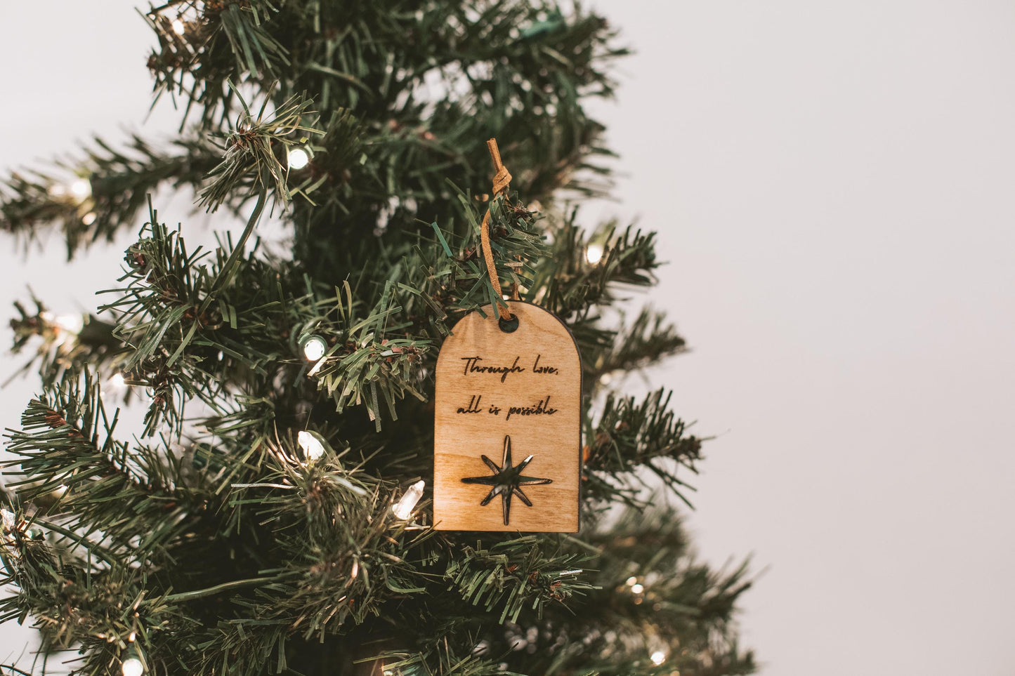 Crescent City "Through love, all is possible" Wooden Ornament